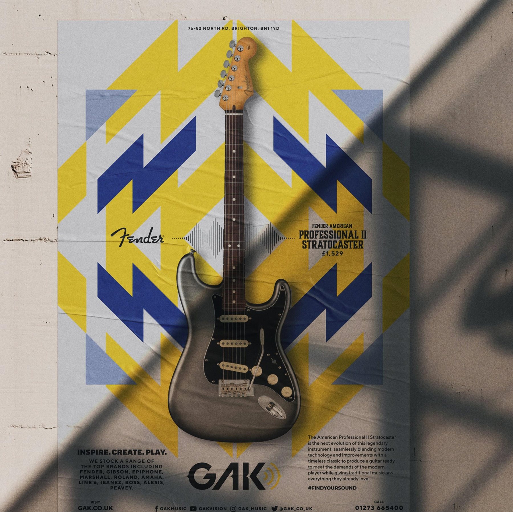 Portrait poster of a guitar with kaleidoscope background of yellow and blue shapes